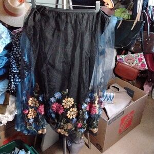 Embroidered lined net skirt __some paint on it. Jean jacket &boots would rock it